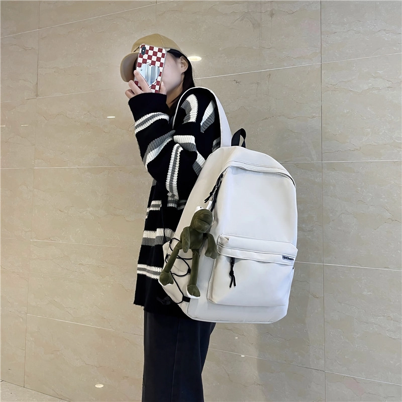 醇龙 耐脏简约书包大学生校园初中背包休闲旅行包 尼龙 双肩包 常规 男女同款情侣款 黑色/白色
