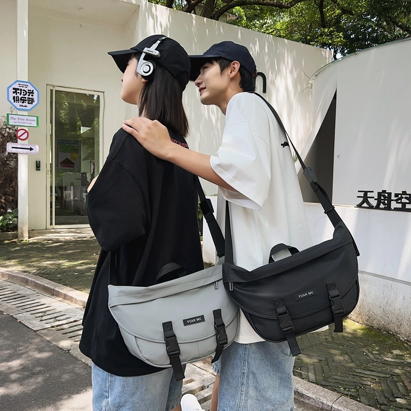 醇龙防泼水外出斜挎包男女初中高中学生单肩书包大容量轻便简约包 皮膜