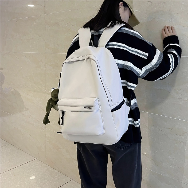 醇龙 耐脏简约书包大学生校园初中背包休闲旅行包 尼龙 双肩包 常规 男女同款情侣款 黑色/白色