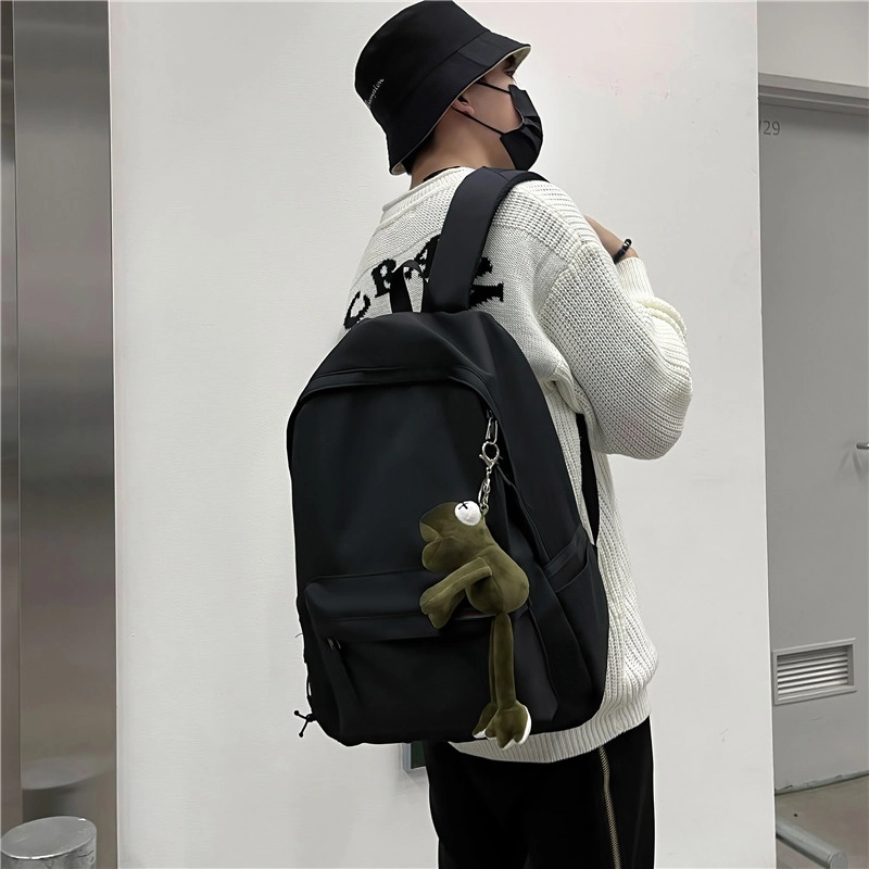 醇龙 耐脏简约书包大学生校园初中背包休闲旅行包 尼龙 双肩包 常规 男女同款情侣款 黑色/白色