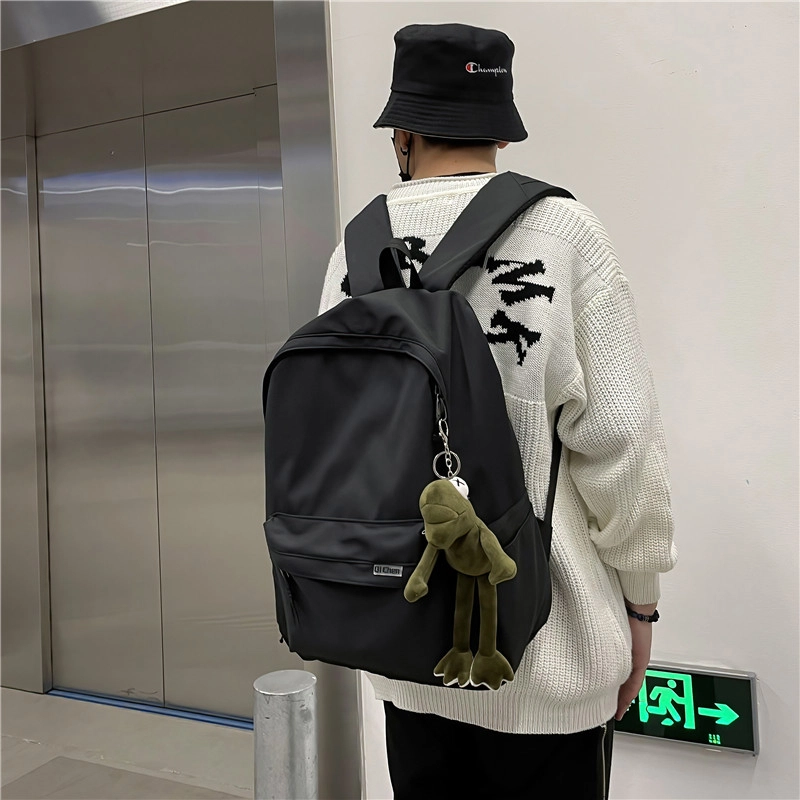 醇龙 耐脏简约书包大学生校园初中背包休闲旅行包 尼龙 双肩包 常规 男女同款情侣款 黑色/白色