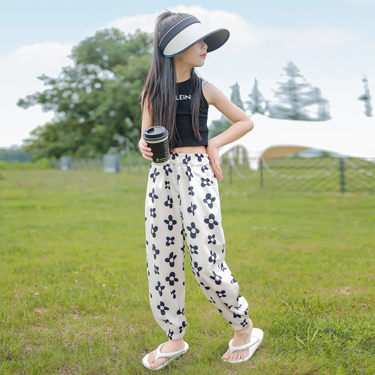 唐狮童装 花朵印花满印松紧腰宽松束脚休闲裤 儿童款 米白色