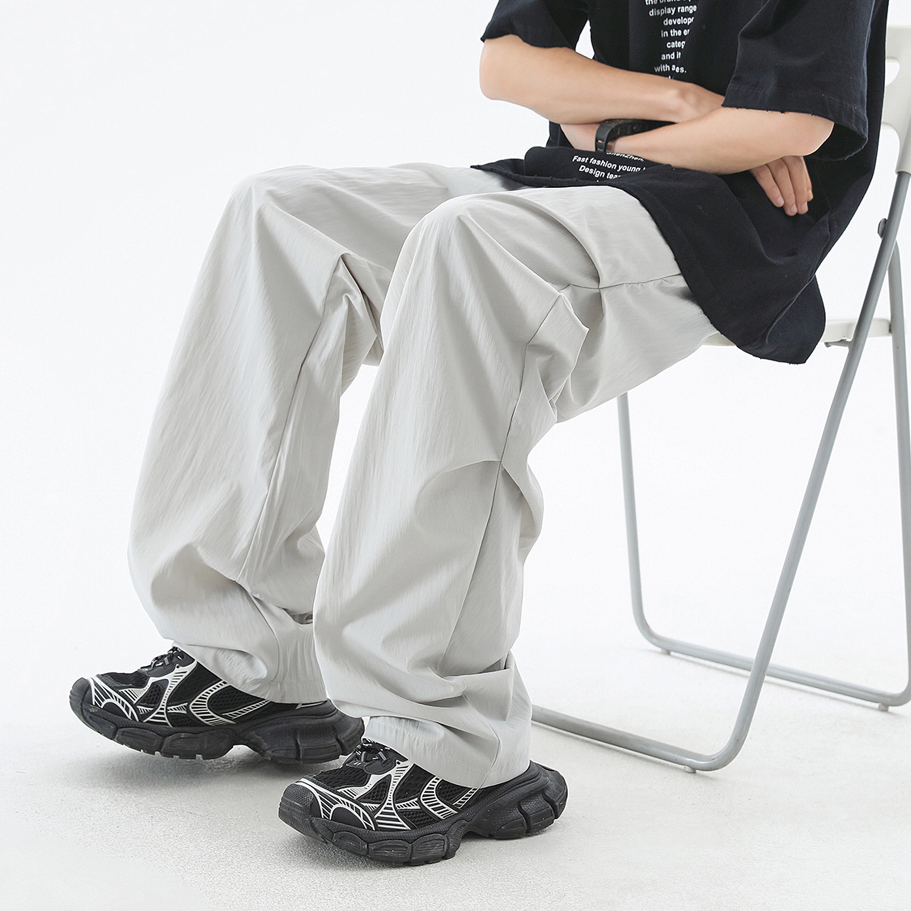爱肯 简约字母印花纯色宽松侧边褶皱凉感伞兵阔腿中腰直筒拖地垂感显瘦休闲裤 男女同款