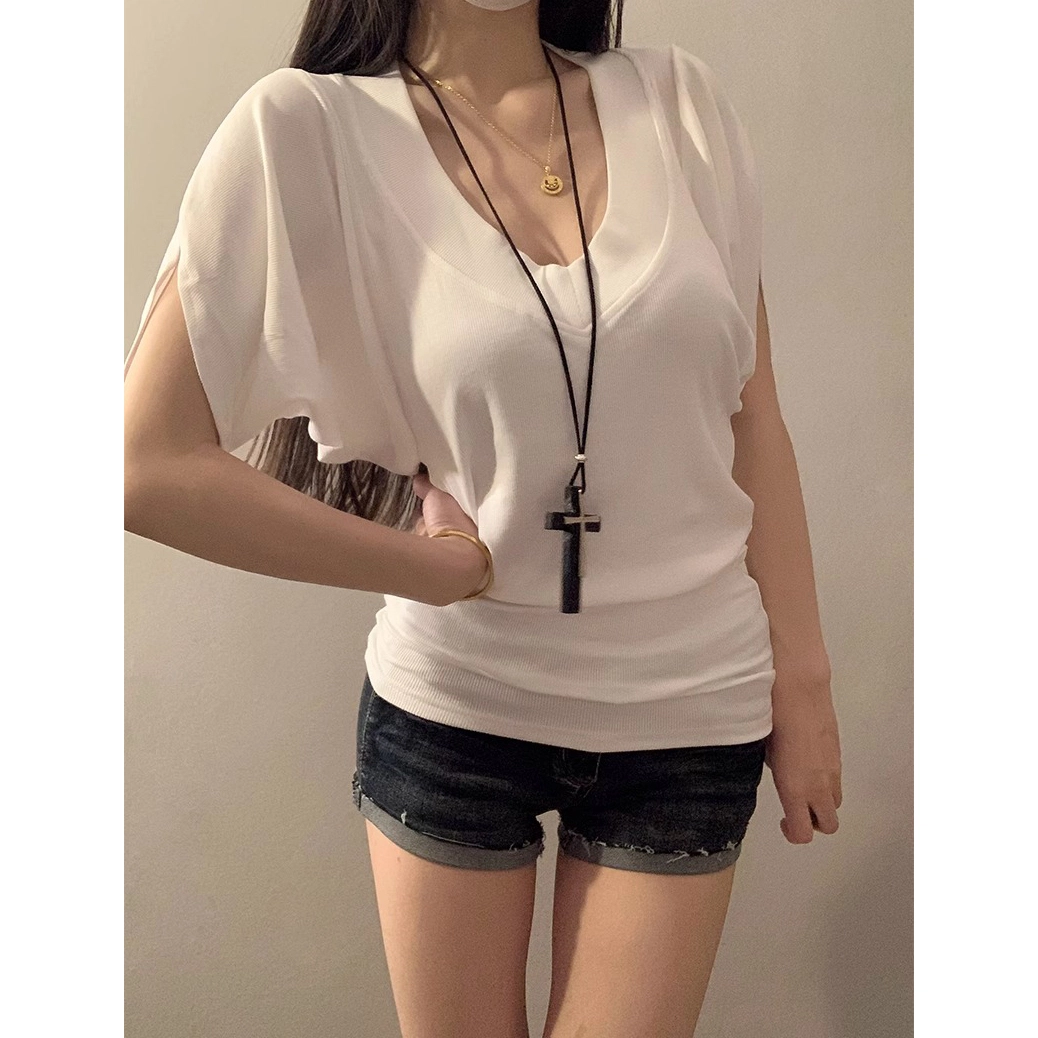 MUCCHIC V T