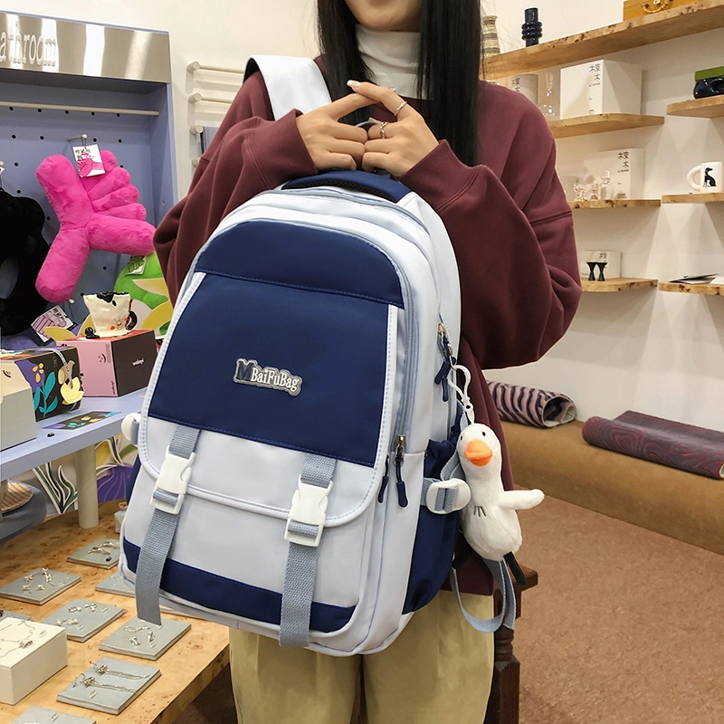 德力熊 带挂件休闲大容量简约百搭轻便拉链开合 尼龙 书包背包双肩包 常规 女款 黑色/红色/卡其色/蓝色