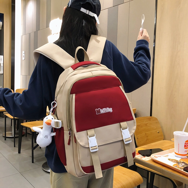 德力熊 带挂件休闲大容量简约百搭轻便拉链开合 尼龙 书包背包双肩包 常规 女款 黑色/红色/卡其色/蓝色