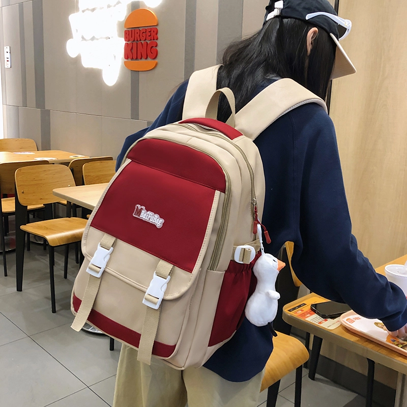 德力熊 带挂件休闲大容量简约百搭轻便拉链开合 尼龙 书包背包双肩包 常规 女款 黑色/红色/卡其色/蓝色
