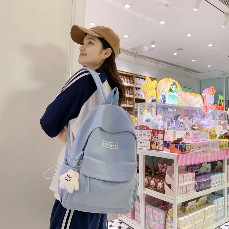 德力熊 美式高级感纯色休闲大容量防水 尼龙 书包背包双肩包 常规 男女同款情侣款 白/黑/蓝/绿/卡其