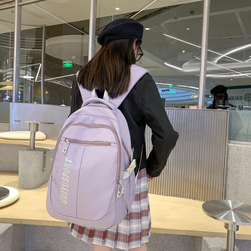 德力熊尼龙书包男女通用多色初中高中生大容量潮牌背包轻便简约大学生双肩包