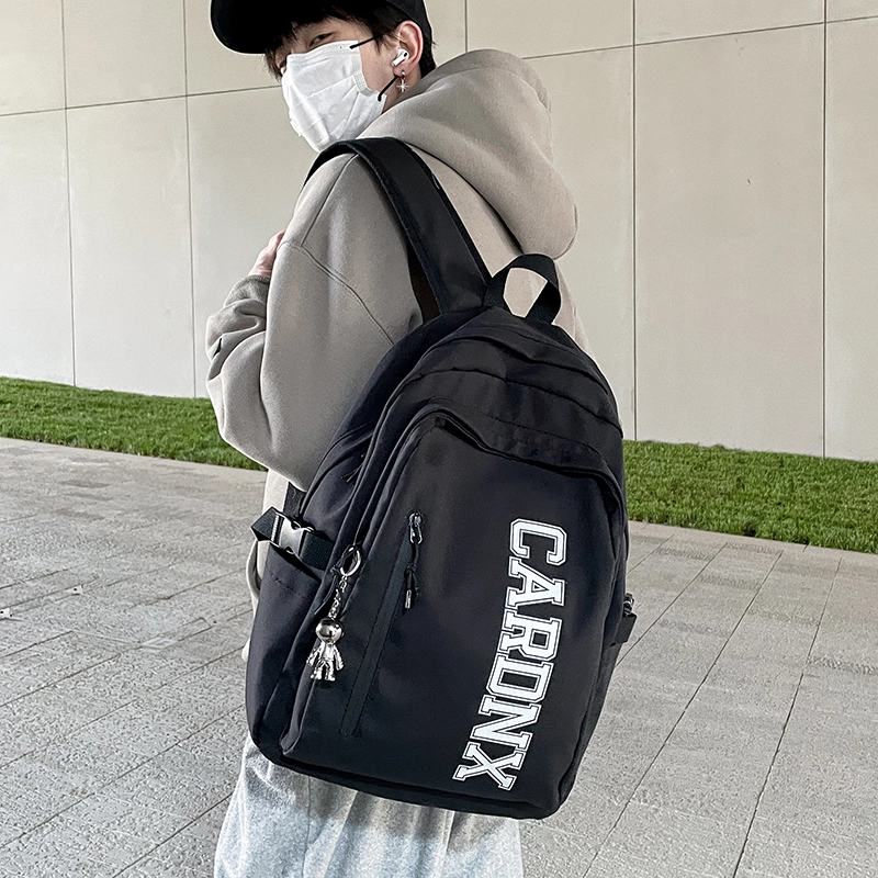 德力熊 大容量韩版大英文字母休闲运动风简约百搭潮酷 尼龙 书包背包双肩包 大号 男女同款情侣款 黑色/白色/蓝色/红色