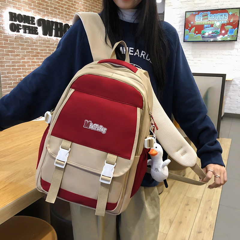 德力熊 带挂件休闲大容量简约百搭轻便拉链开合 尼龙 书包背包双肩包 常规 女款 黑色/红色/卡其色/蓝色