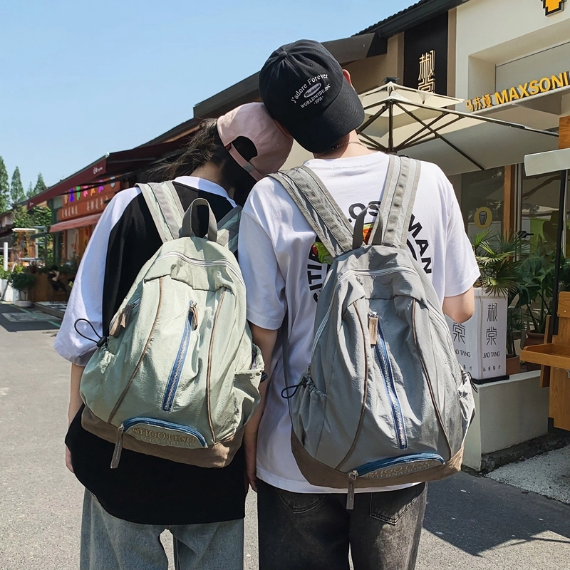 德力熊 休闲大容量竖拉链英文简约百搭 尼龙 书包背包双肩包 常规 男女同款情侣款 黑色/绿色/粉色/红色/黑色