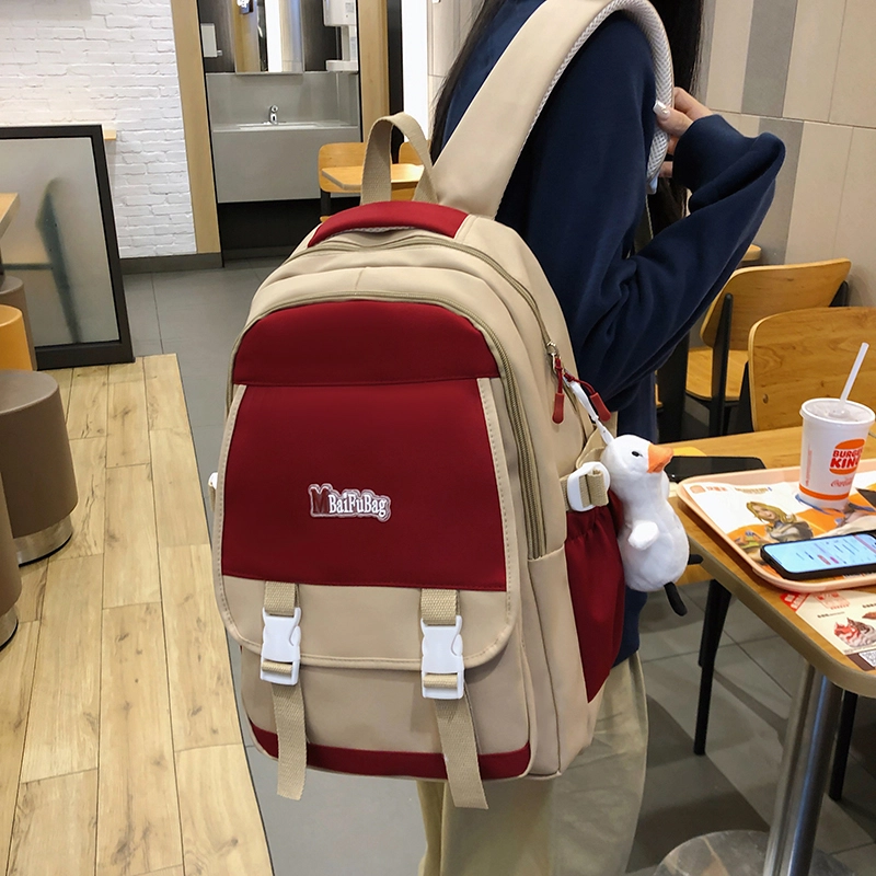 德力熊 带挂件休闲大容量简约百搭轻便拉链开合 尼龙 书包背包双肩包 常规 女款 黑色/红色/卡其色/蓝色