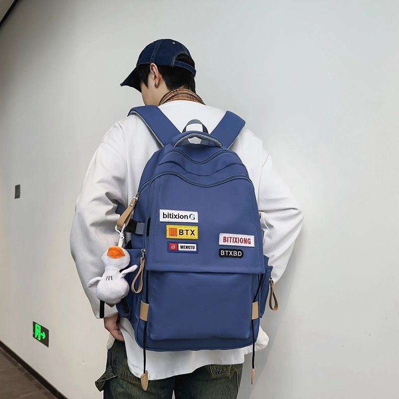 德力熊双肩包尼龙男女通用多色学生书包学院风情侣旅行休闲包学生包大容量耐磨耐脏