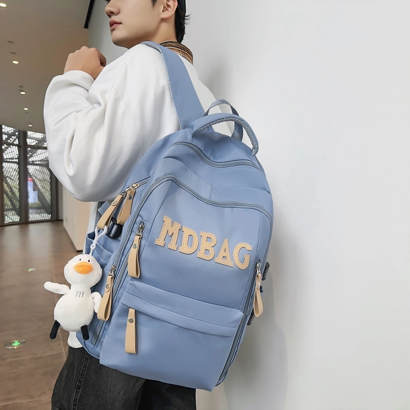 德力熊 小学生初中校园风结实耐脏 尼龙 电脑包旅行书包背包双肩包 常规 男女同款情侣款 红色/黑色/蓝色/白色