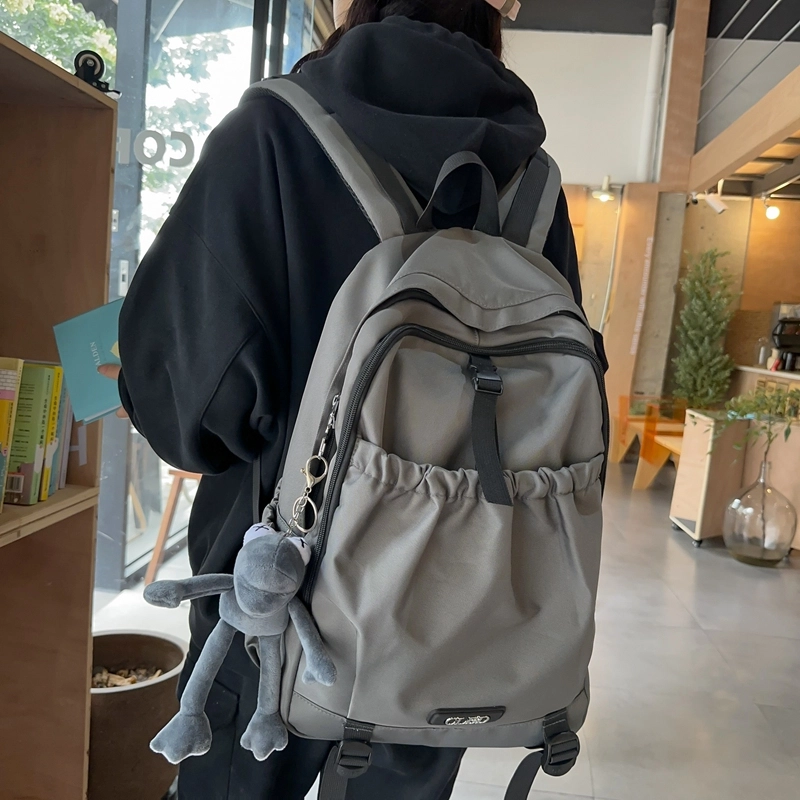 德力熊 轻便百搭简约大容量通用 尼龙 背包双肩包 常规 男女同款情侣款 黑色/粉色/白色/灰色