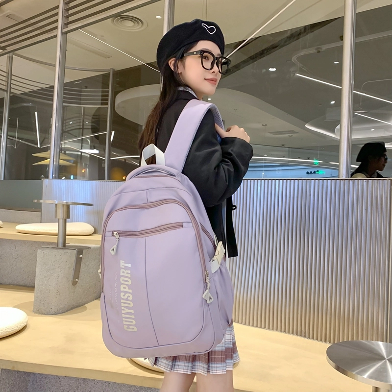 德力熊尼龙书包男女通用多色初中高中生大容量潮牌背包轻便简约大学生双肩包