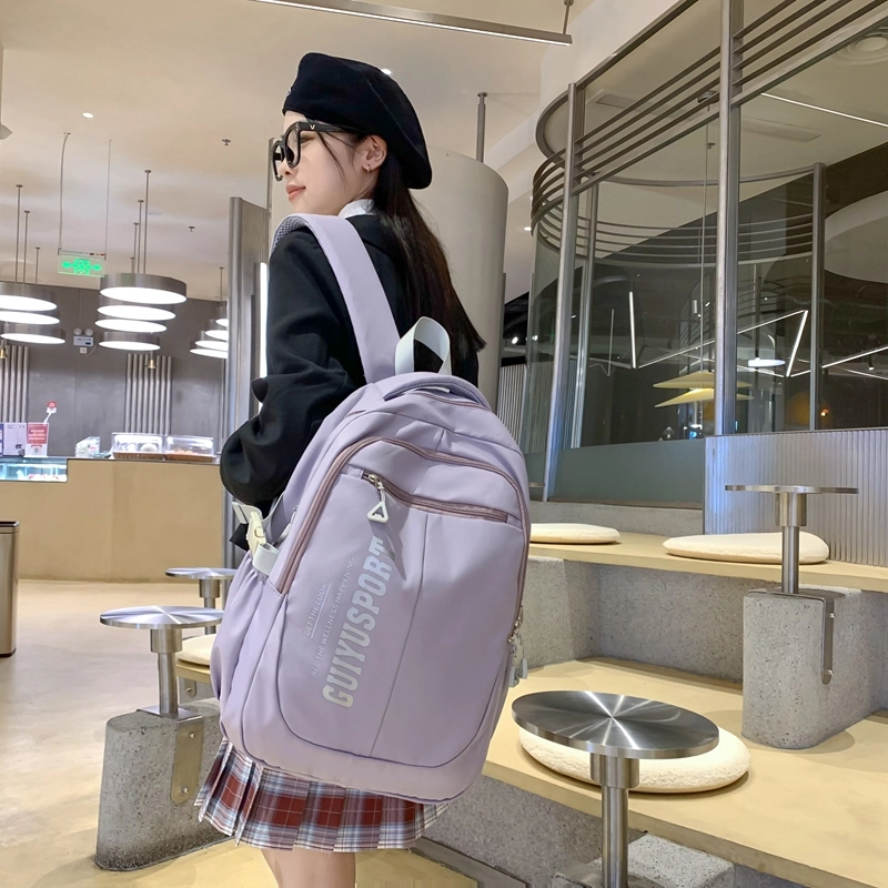 德力熊尼龙书包男女通用多色初中高中生大容量潮牌背包轻便简约大学生双肩包