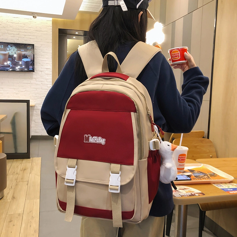 德力熊 带挂件休闲大容量简约百搭轻便拉链开合 尼龙 书包背包双肩包 常规 女款 黑色/红色/卡其色/蓝色
