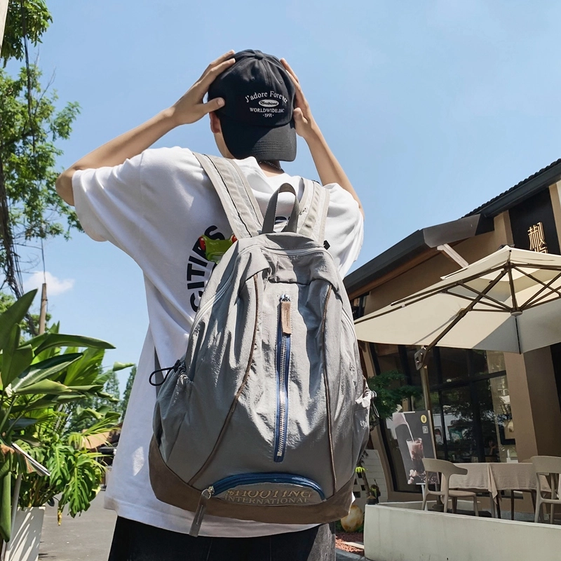 德力熊 休闲大容量竖拉链英文简约百搭 尼龙 书包背包双肩包 常规 男女同款情侣款 黑色/绿色/粉色/红色/黑色