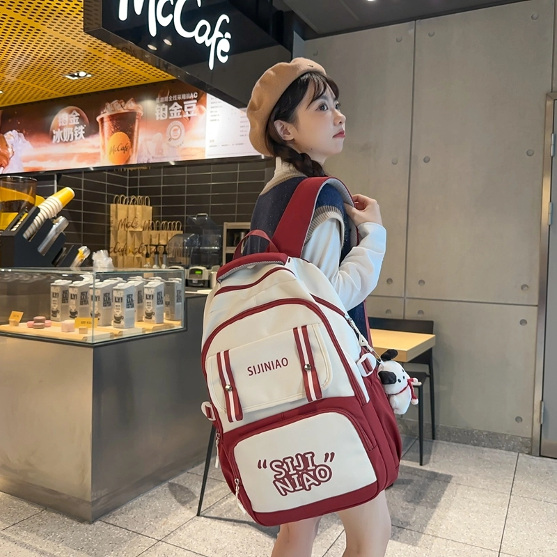 德力熊双肩包女初中女生大容量高中生小学生尼龙高颜值五六年级书包减负背包男女通用 多色