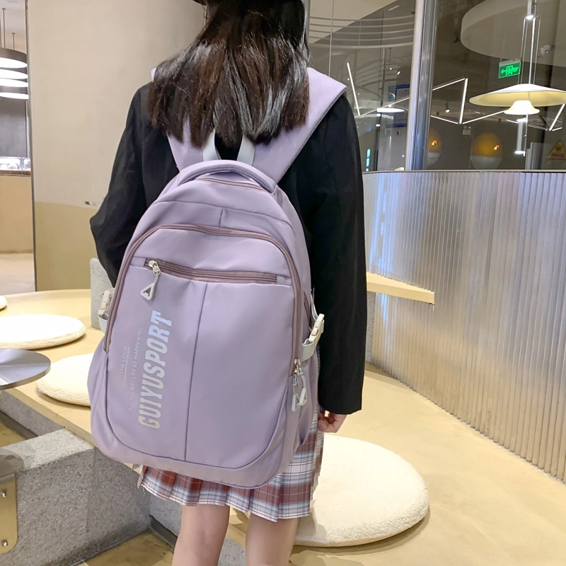 德力熊尼龙书包男女通用多色初中高中生大容量潮牌背包轻便简约大学生双肩包