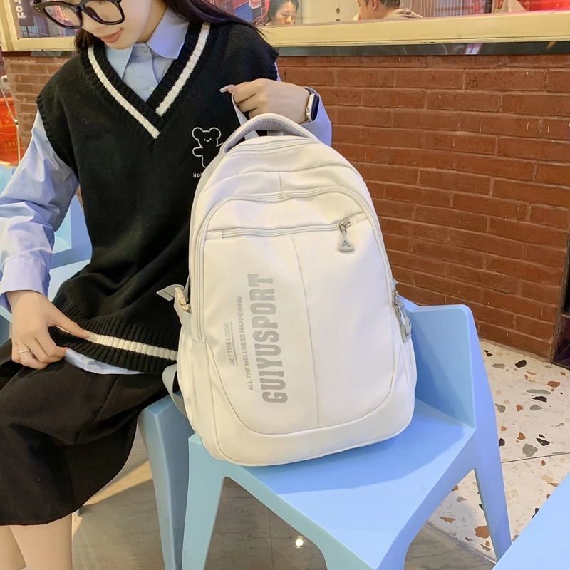德力熊尼龙书包男女通用多色初中高中生大容量潮牌背包轻便简约大学生双肩包