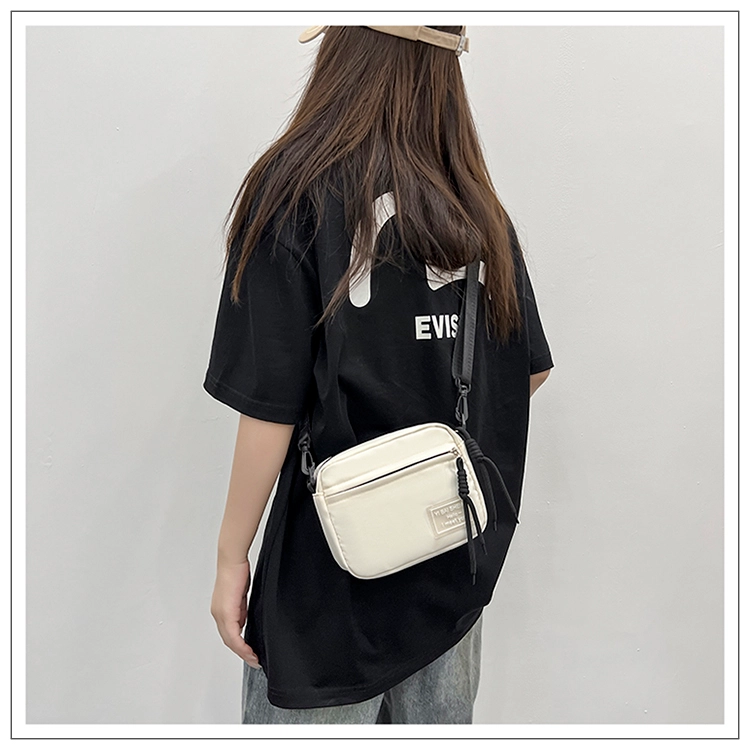 彤彤兔 时尚休闲潮流 尼龙 斜挎包 常规 男女同款情侣款 黑色/白色/卡其