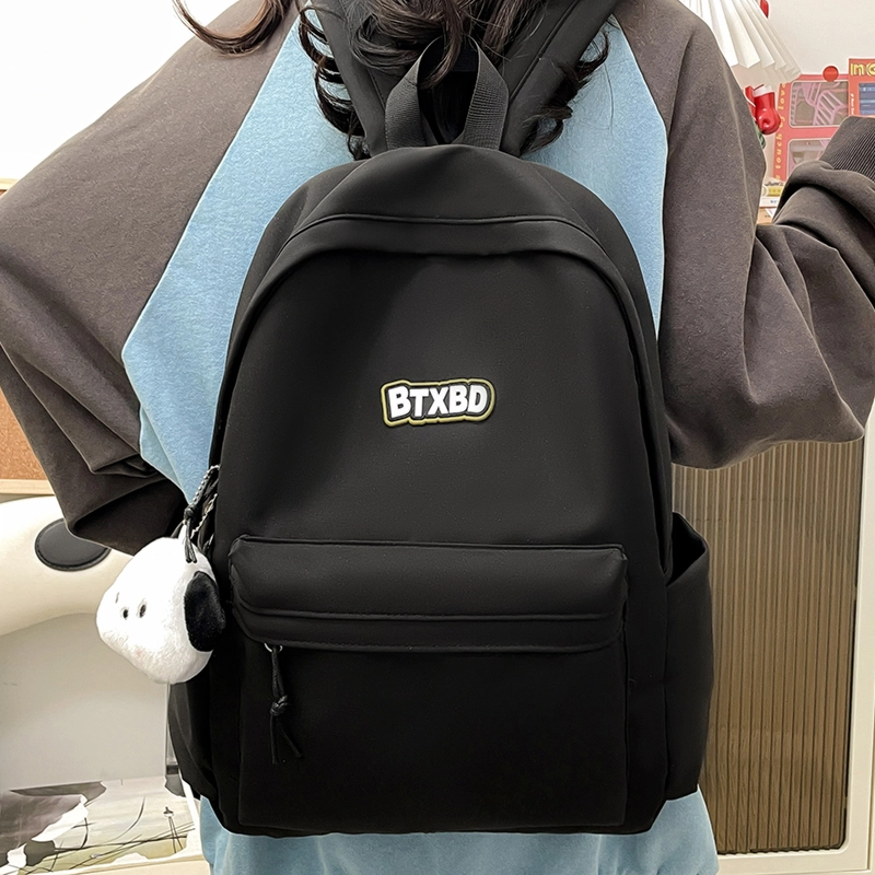 德力熊  尼龙男女通用多色高颜值学生书包纯色大容量双肩包尼龙简约百搭小众背包