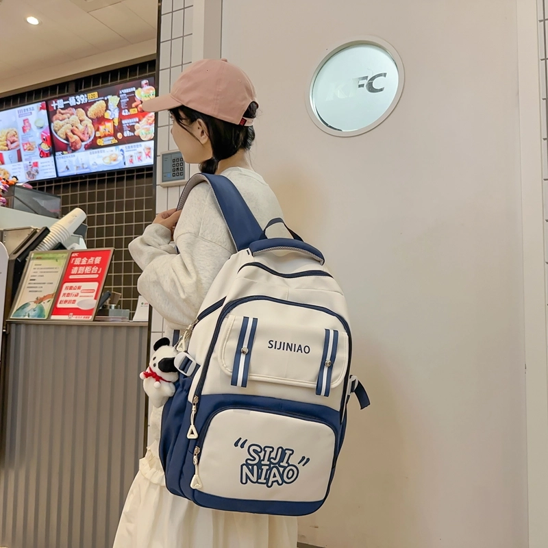 德力熊双肩包女初中女生大容量高中生小学生尼龙高颜值五六年级书包减负背包男女通用 多色