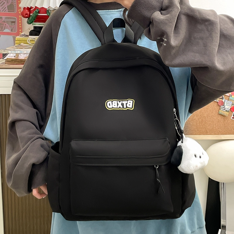 德力熊  尼龙男女通用多色高颜值学生书包纯色大容量双肩包尼龙简约百搭小众背包