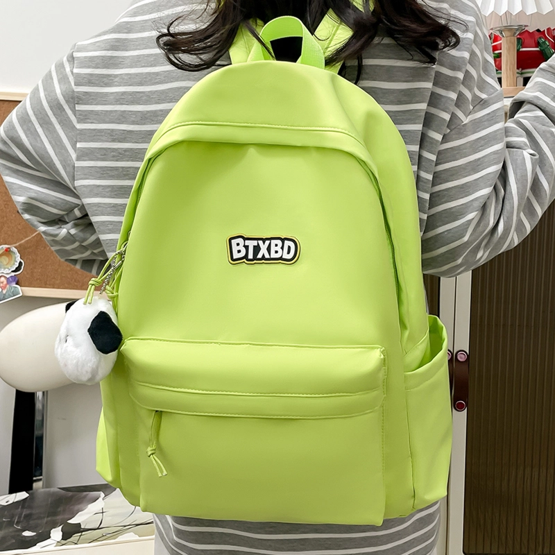 德力熊  尼龙男女通用多色高颜值学生书包纯色大容量双肩包尼龙简约百搭小众背包
