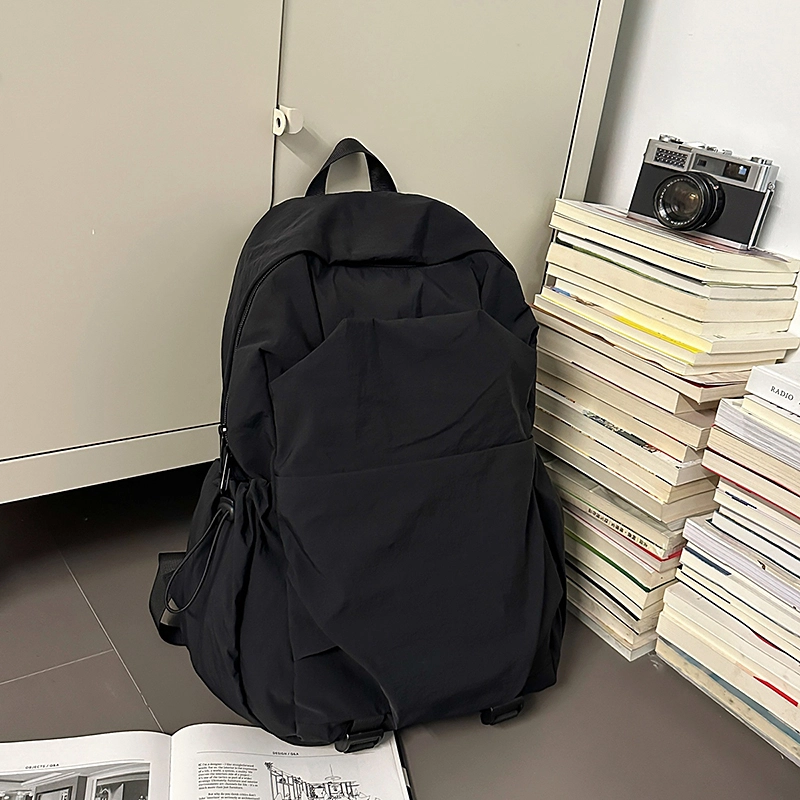 德力熊 纯色简约大容量轻便百搭 尼龙 双肩包 常规 男女同款情侣款 黑色/灰色/棕色/绿色