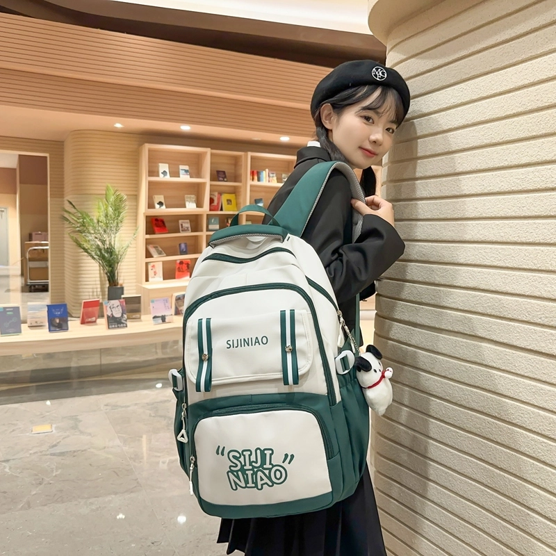 德力熊双肩包女初中女生大容量高中生小学生尼龙高颜值五六年级书包减负背包男女通用 多色