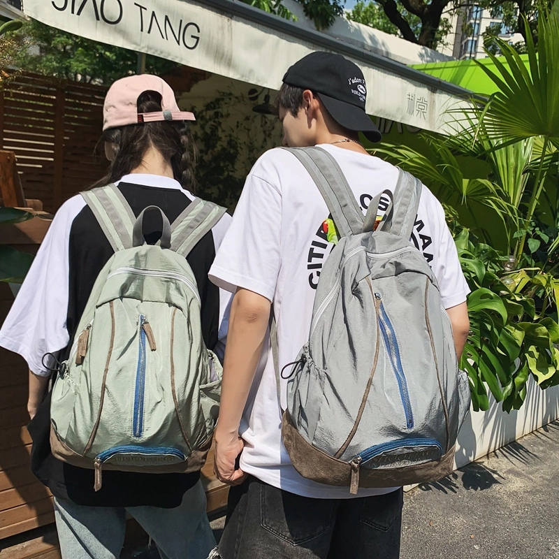 德力熊 休闲大容量竖拉链英文简约百搭 尼龙 书包背包双肩包 常规 男女同款情侣款 黑色/绿色/粉色/红色/黑色