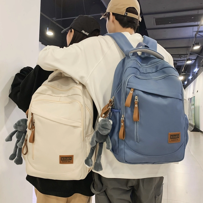 德力熊 潮牌大容量防水轻便多口袋 尼龙 书包背包双肩包 常规 男女同款情侣款 米白色/灰色/红色/蓝色/黑色