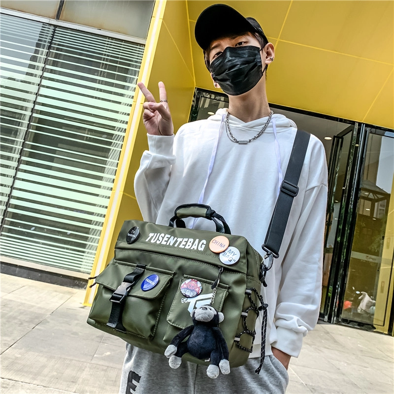 德力熊单肩包运动旅行包斜挎简约尼龙工装包男女通用情侣款 多色
