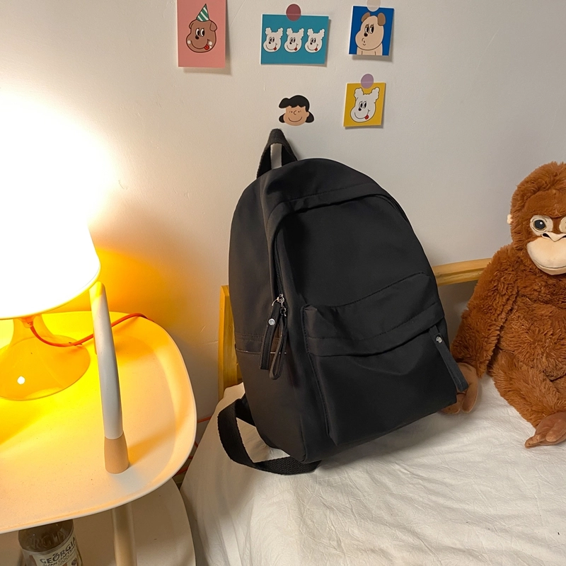 德力熊 纯色大容量书包背包简约通勤轻便旅行 尼龙 双肩包 常规 男女同款情侣款 黑色/蓝色/绿色/粉色/白色