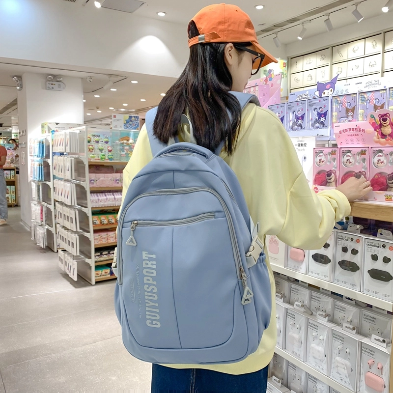 德力熊尼龙书包男女通用多色初中高中生大容量潮牌背包轻便简约大学生双肩包