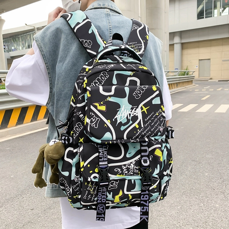德力熊 印花轻便大容量 尼龙 书包背包双肩包 大号 男女同款情侣款 黑色/白色