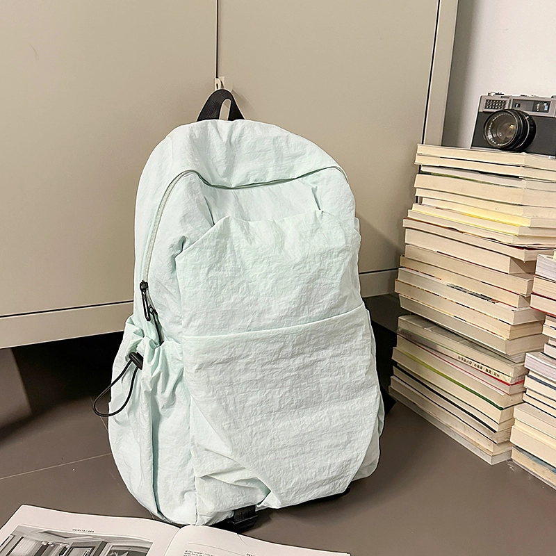 德力熊 纯色简约大容量轻便百搭 尼龙 双肩包 常规 男女同款情侣款 黑色/灰色/棕色/绿色