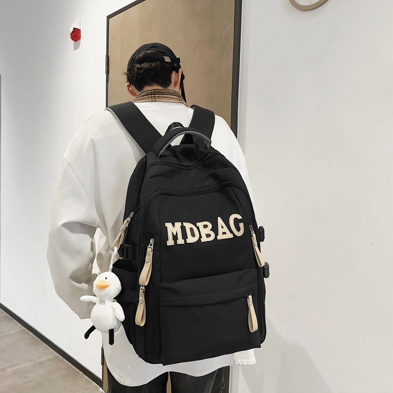 德力熊 小学生初中校园风结实耐脏 尼龙 电脑包旅行书包背包双肩包 常规 男女同款情侣款 红色/黑色/蓝色/白色