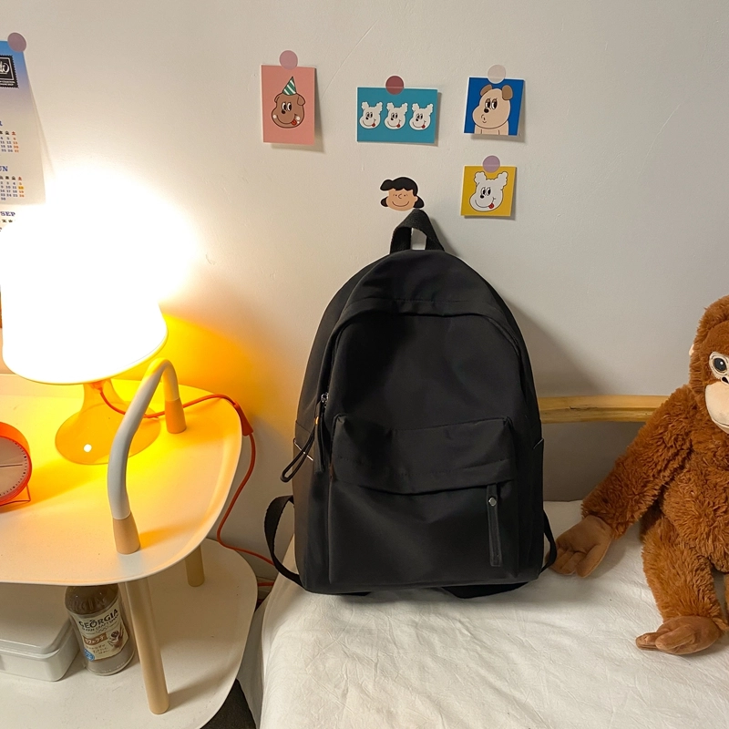 德力熊 纯色大容量书包背包简约通勤轻便旅行 尼龙 双肩包 常规 男女同款情侣款 黑色/蓝色/绿色/粉色/白色
