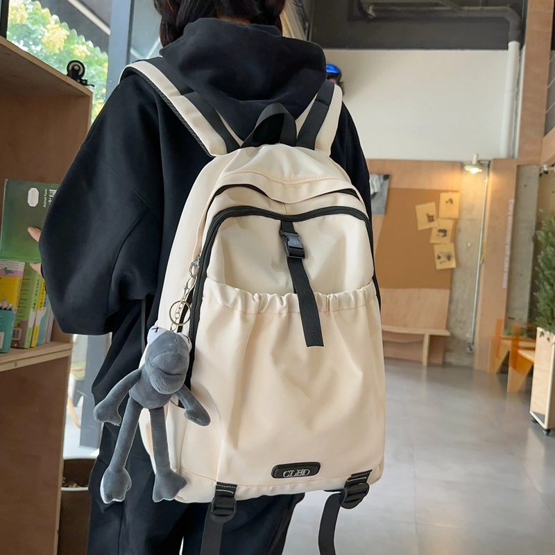 德力熊 轻便百搭简约大容量通用 尼龙 背包双肩包 常规 男女同款情侣款 黑色/粉色/白色/灰色