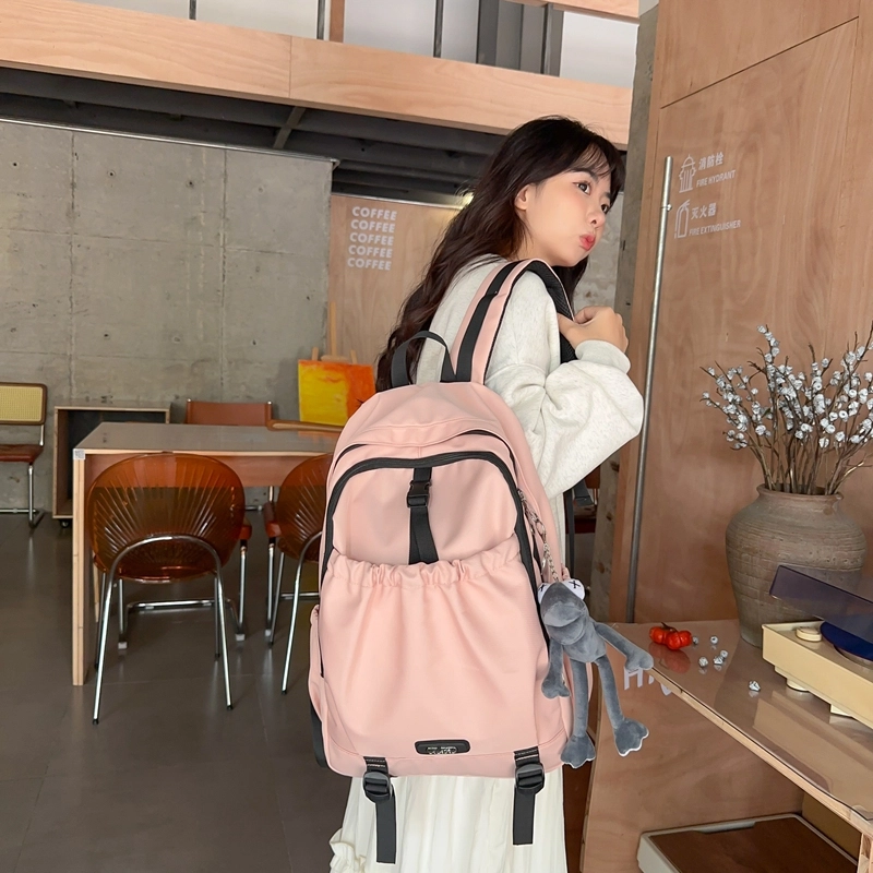 德力熊 轻便百搭简约大容量通用 尼龙 背包双肩包 常规 男女同款情侣款 黑色/粉色/白色/灰色