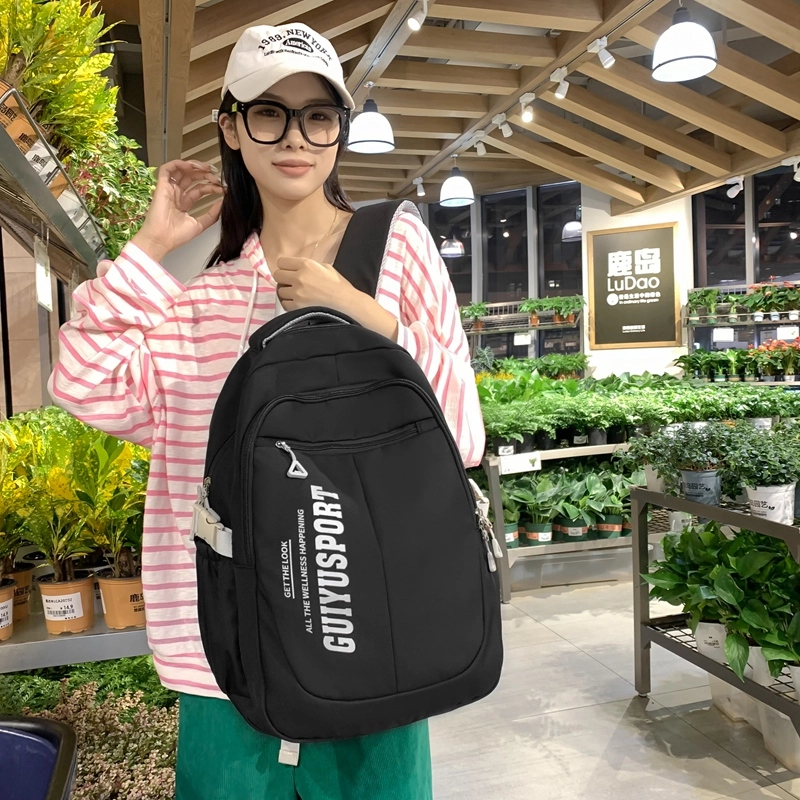 德力熊尼龙书包男女通用多色初中高中生大容量潮牌背包轻便简约大学生双肩包