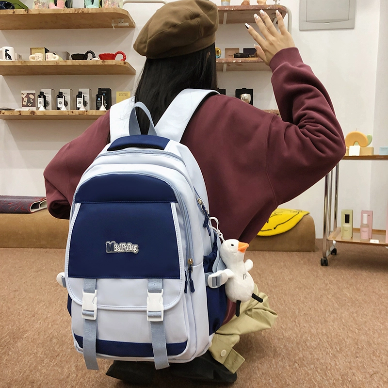 德力熊 带挂件休闲大容量简约百搭轻便拉链开合 尼龙 书包背包双肩包 常规 女款 黑色/红色/卡其色/蓝色