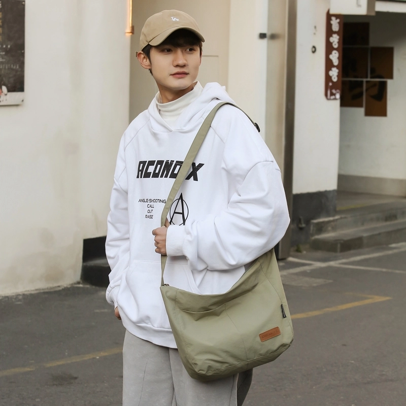 德力熊 尼龙 男女通用 多色 单肩包 日系纯色斜挎学生书包防水轻便大容量包