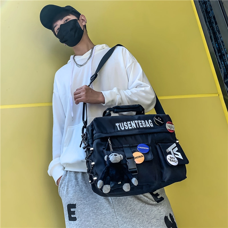 德力熊单肩包运动旅行包斜挎简约尼龙工装包男女通用情侣款 多色