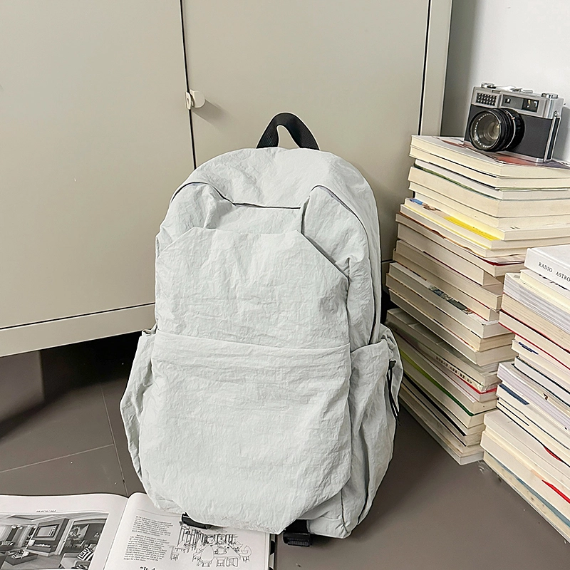 德力熊 纯色简约大容量轻便百搭 尼龙 双肩包 常规 男女同款情侣款 黑色/灰色/棕色/绿色